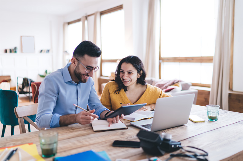 Couple looking at laptop